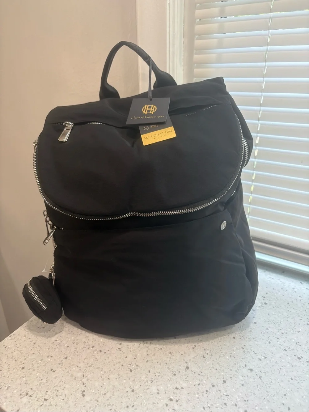 NWT House of Harlow 1960 backpack in a classic black w/ silver-tone hardware
